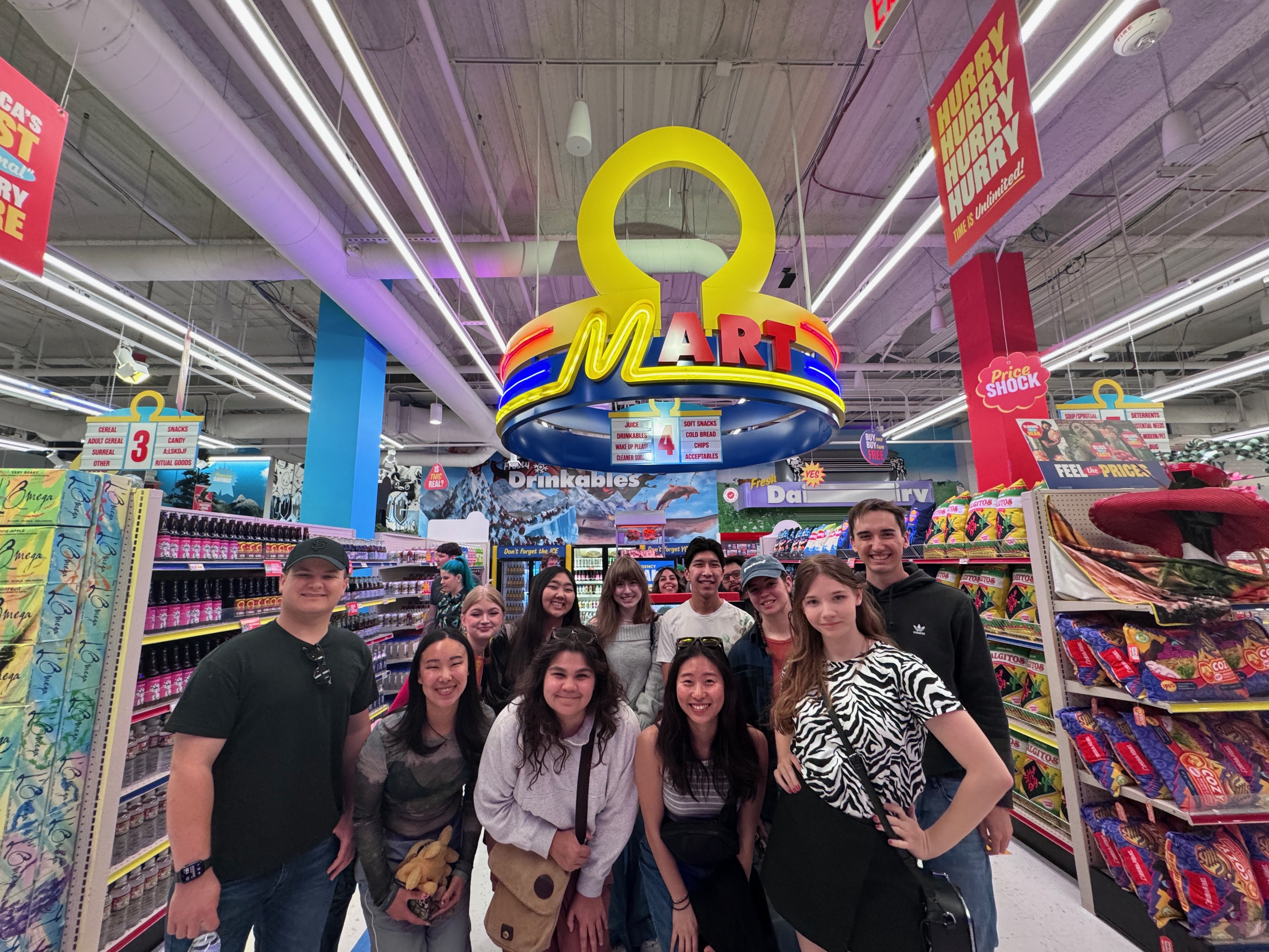 Scream USC at a behind-the-scenes tour at Meow Wolf's Omega Mart